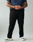 Wide the Brand | Men wearing a pair of black stretch pull-up plus size work trousers