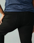 Wide the Brand | Men wearing a pair of black stretch pull-up plus size work trousers