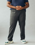 Wide the Brand | Men wearing a pair of dark grey stretch pull-up plus size work trousers